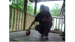 Most Left-Handed Behind-The-Back Shots Made Into A Little Tikes Basketball Hoop While Kneeling In One Minute 